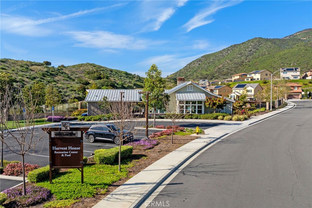 259 Spotted Saddle Way Fallbrook, CA 92028 - Photo 36 of 43 a view of swimming pool with outdoor seating and a garden