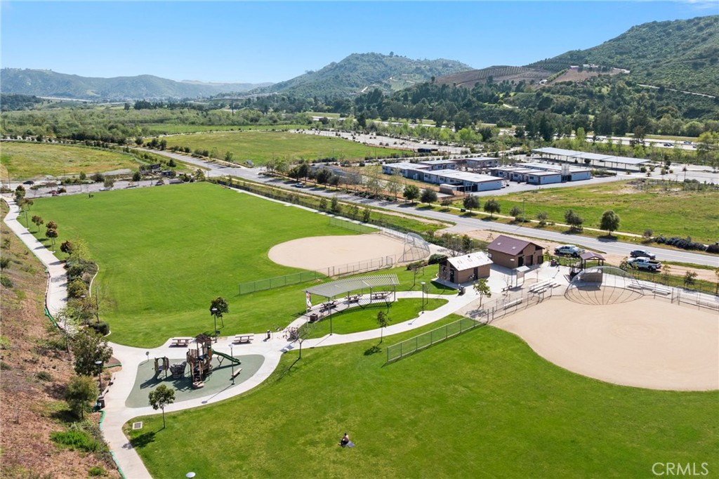 259 Spotted Saddle Way Fallbrook, CA 92028 - Photo 42 of 43 a view of a swimming pool with a yard