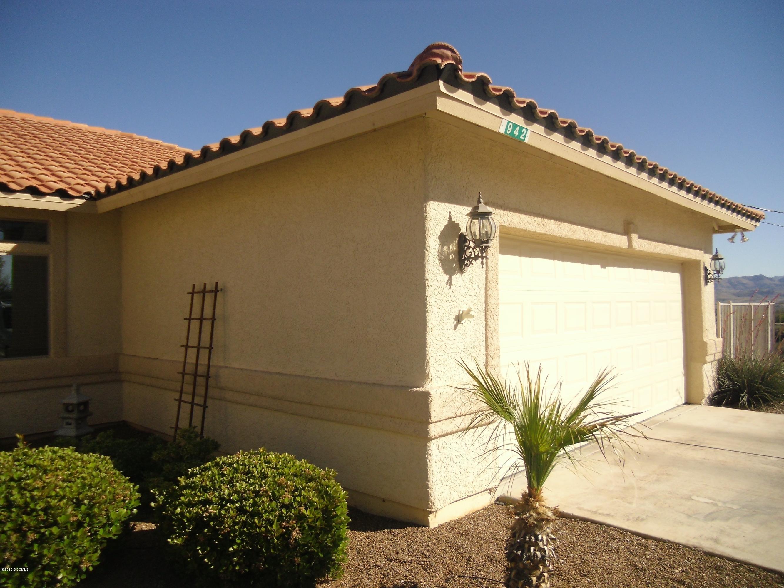 942 Via Puebla Rio Rico, AZ 85648 - Photo 68 of 73 a front view of a house with a yard