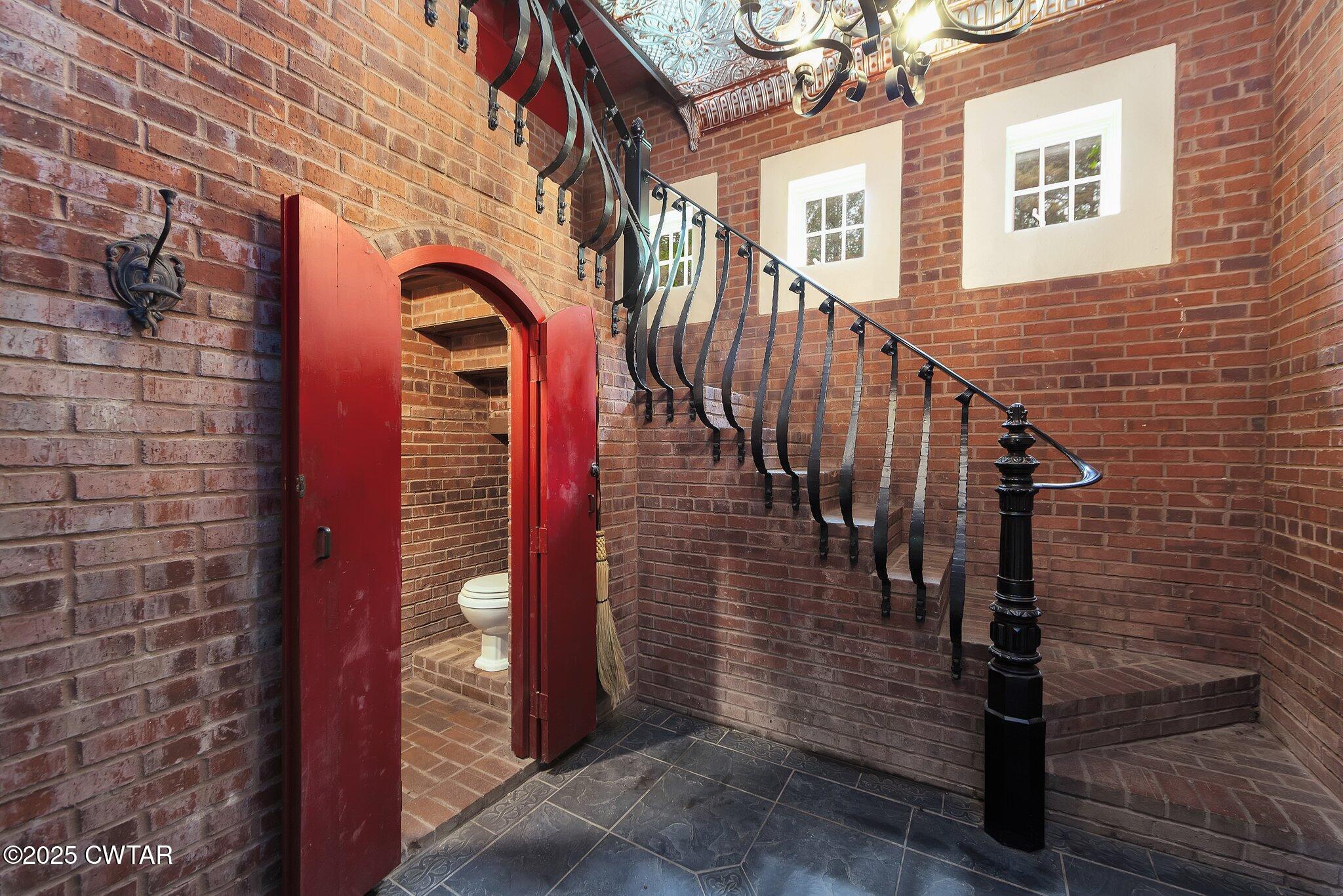 1620 Dry Creek Road Pinson, TN 38366 - Photo 27 of 51 a view of front door of house with stairs