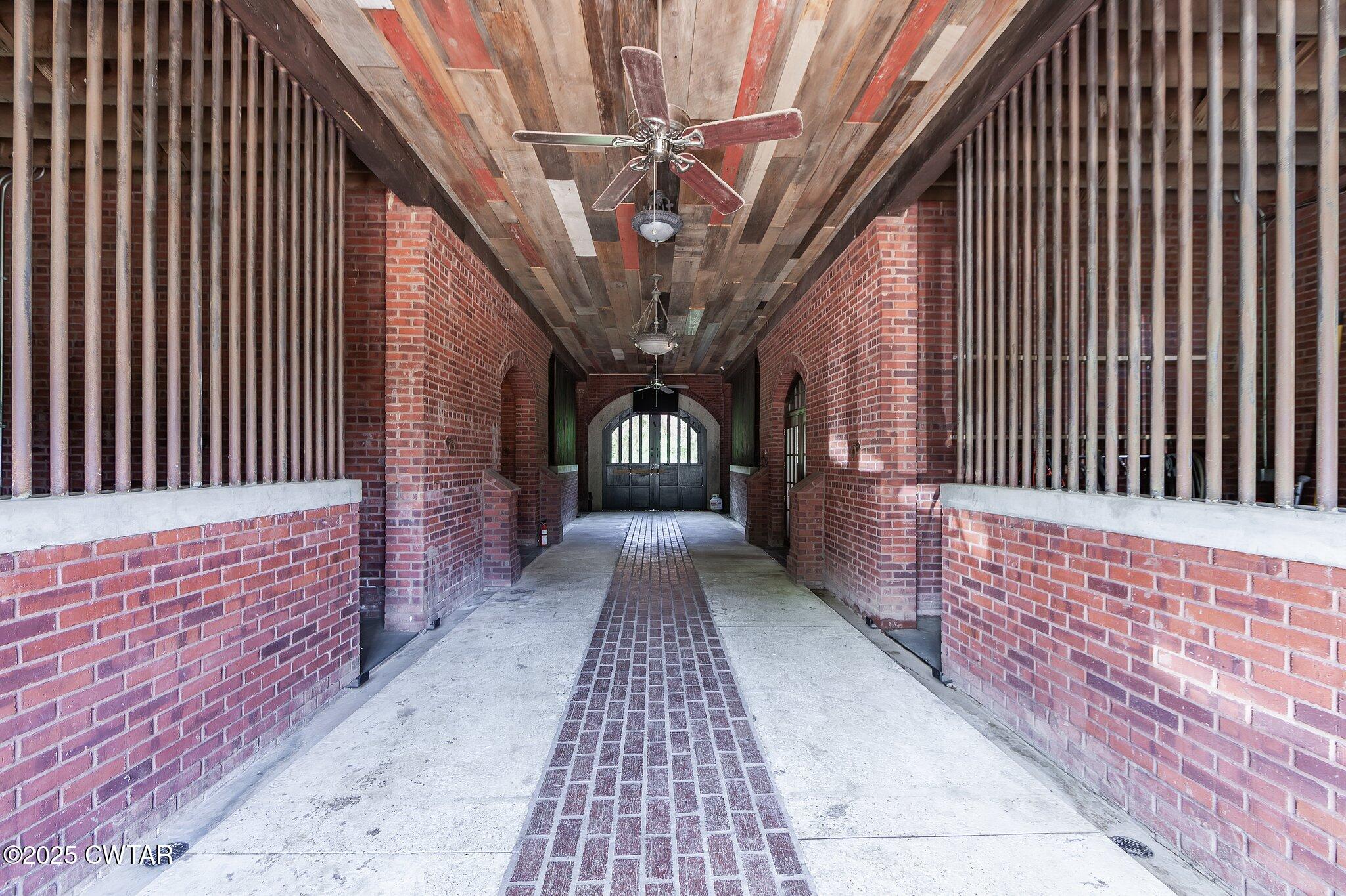 1620 Dry Creek Road Pinson, TN 38366 - Photo 33 of 51 a view of balcony with wooden floor
