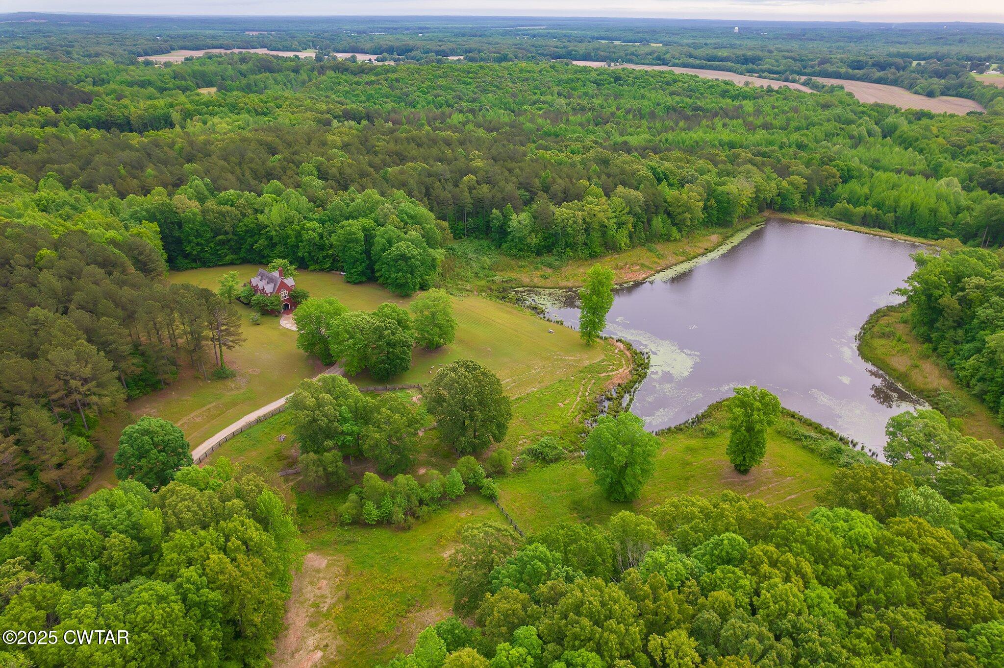 1620 Dry Creek Road Pinson, TN 38366 - Photo 39 of 51 an aerial view of a house
