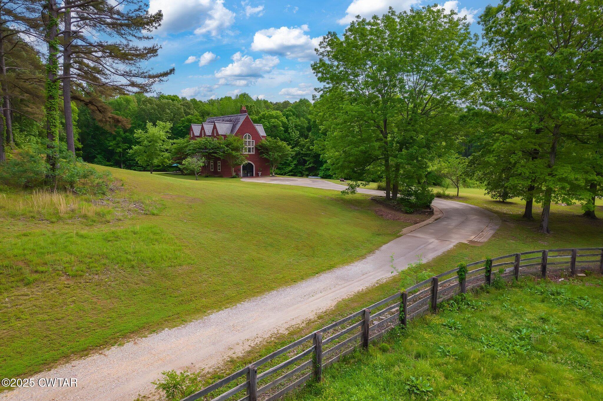 1620 Dry Creek Road Pinson, TN 38366 - Photo 45 of 51 a view of a garden with an ocean