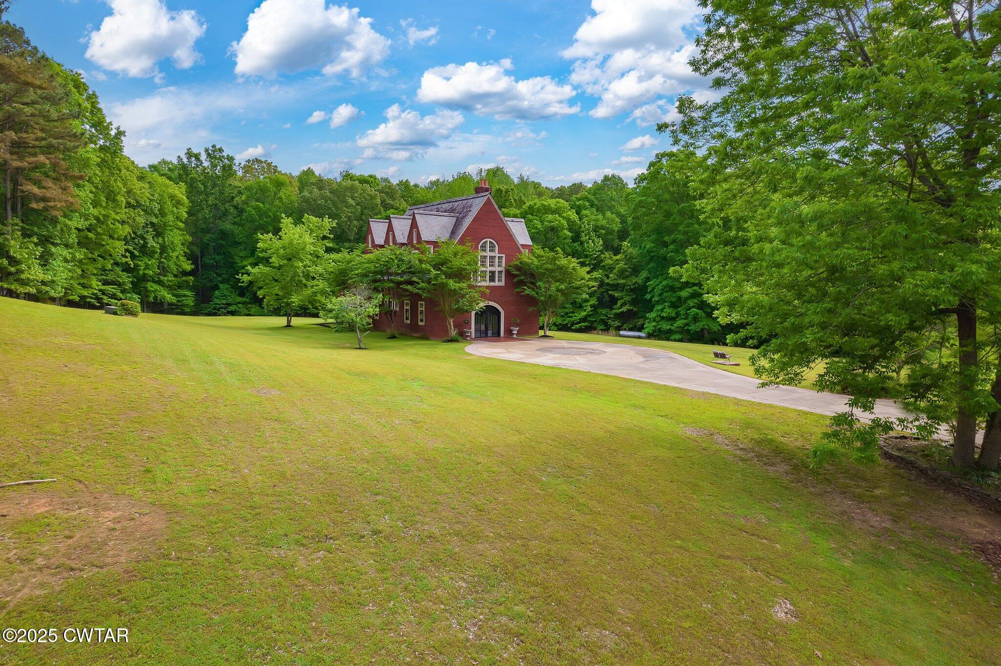 1620 Dry Creek Road Pinson, TN 38366 - Photo 46 of 51 a view of an outdoor space and a yard