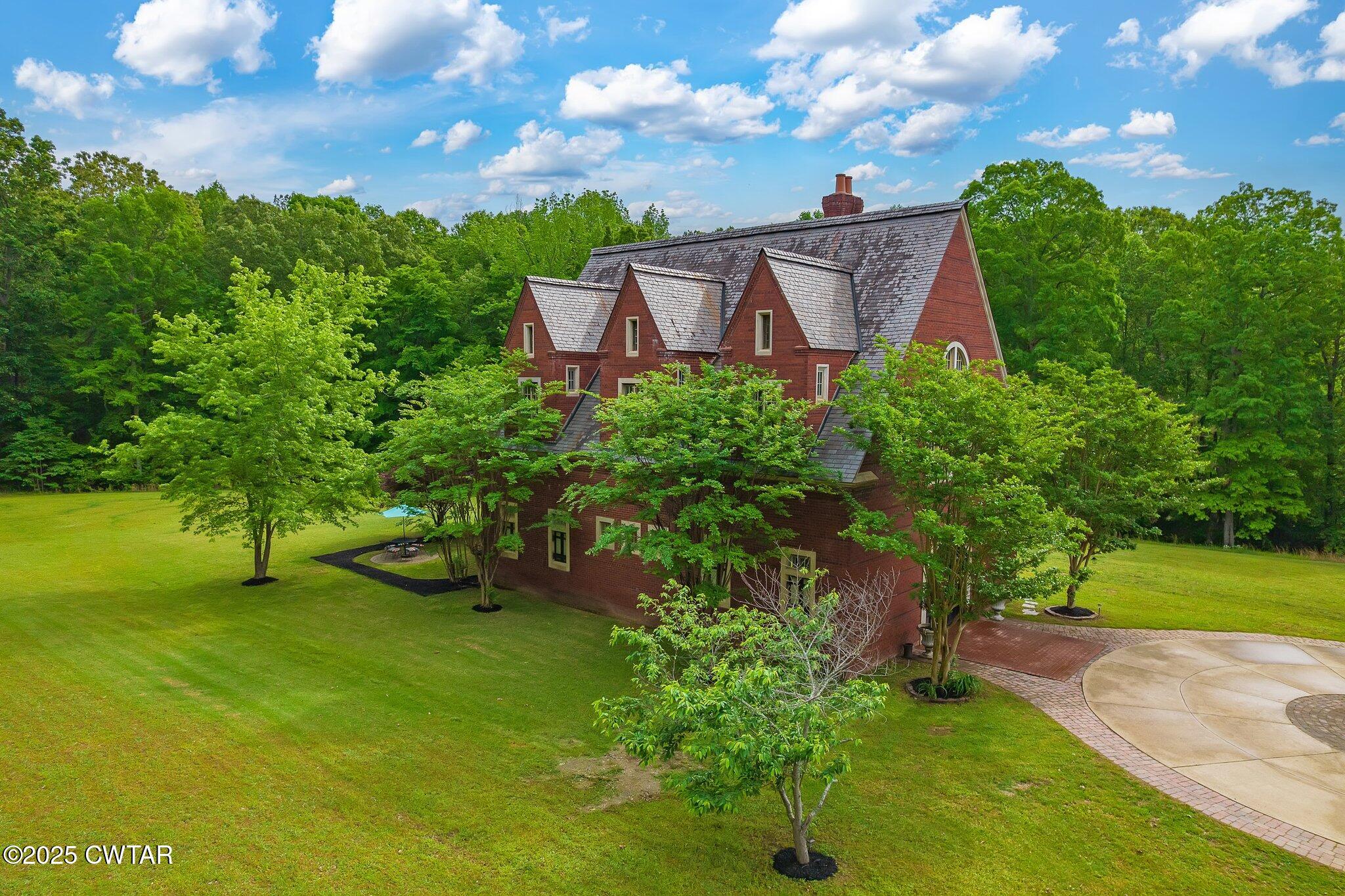 1620 Dry Creek Road Pinson, TN 38366 - Photo 47 of 51 a view of a garden