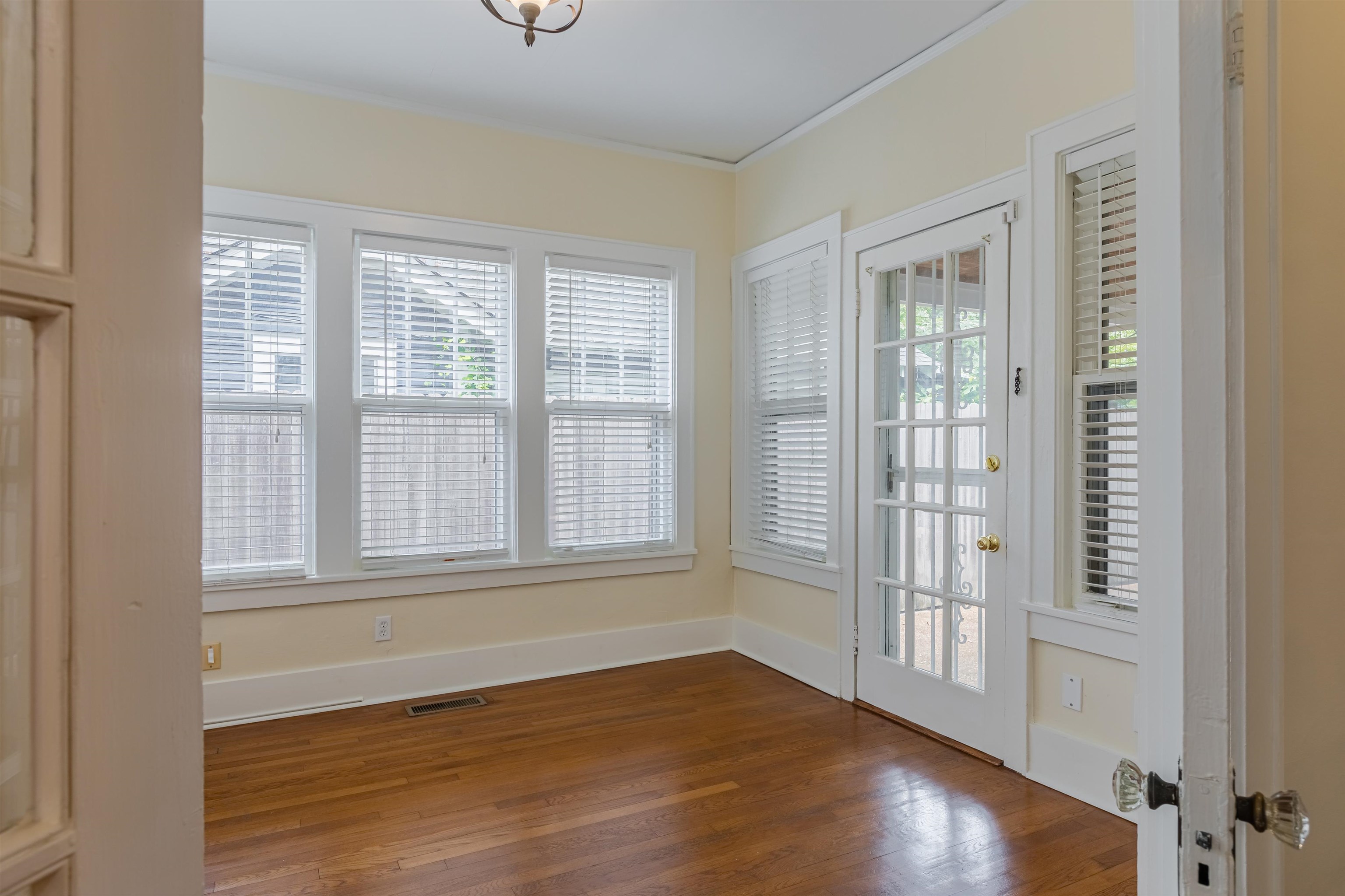 590 South Rembert Street Memphis, TN 38104 - Photo 6 of 18 The room exits to a covered side porch.