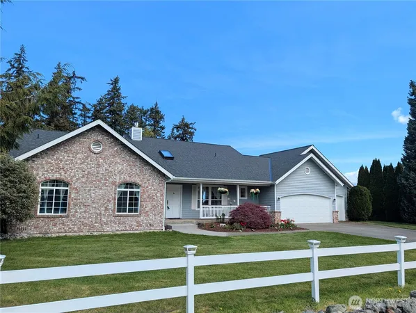a view of a lake with a yard