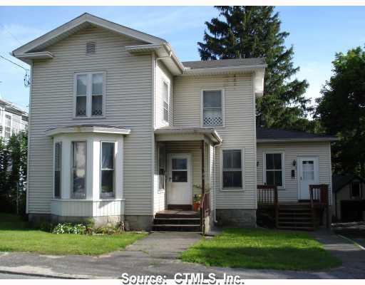 36 High Street Winchester, CT 06098 - Photo 1 of 1 a front view of a house with a yard