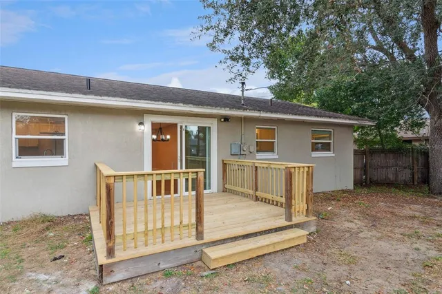 a view of a deck with a yard