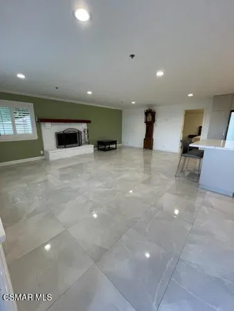 a view of a living room with furniture