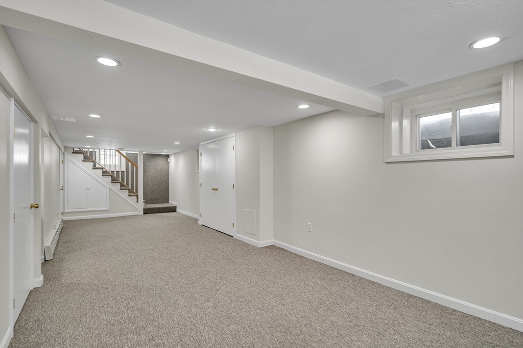 10 Dexter Road Lexington, MA 02420 - Photo 34 of 35 an empty room with a hallway