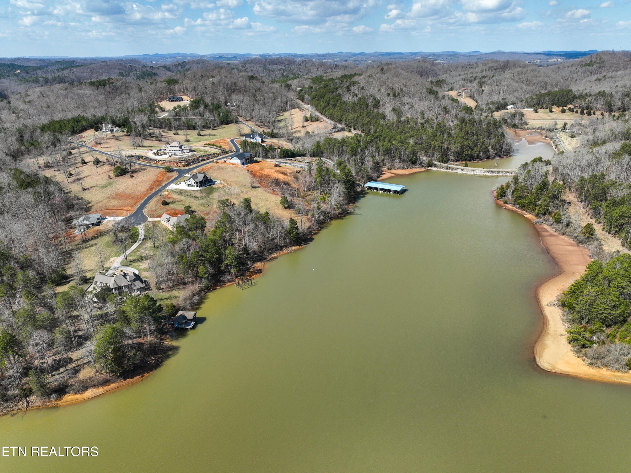 0 Springwater Run Madisonville, TN 37354 - Photo 15 of 20 a view of a lake in middle of the town