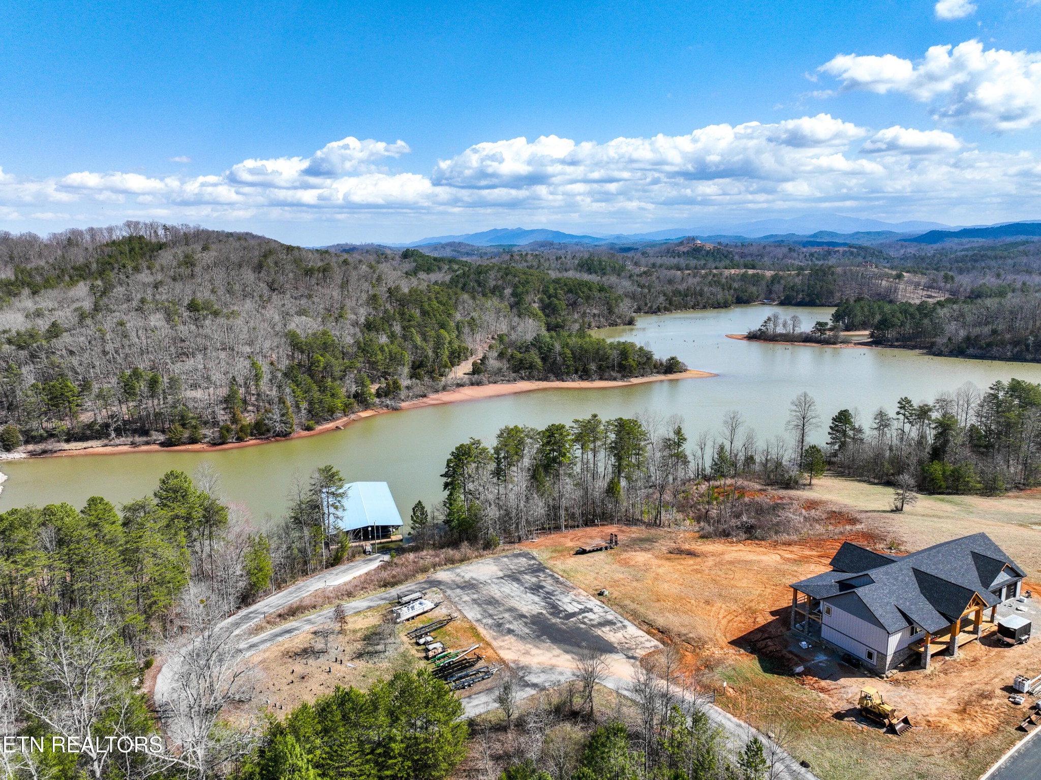 0 Springwater Run Madisonville, TN 37354 - Photo 16 of 20 a view of a lake in middle of the town