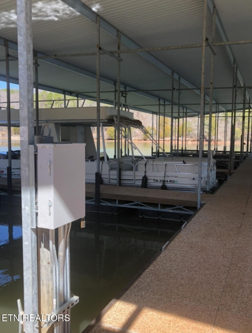 0 Springwater Run Madisonville, TN 37354 - Photo 19 of 20 a kitchen with a sink a counter top space and wooden floor