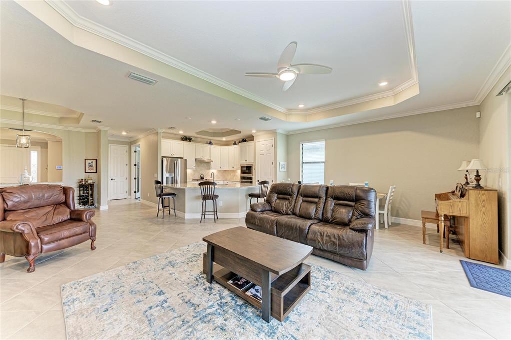 5810 Brandon Run Bradenton, FL 34211 - Photo 16 of 65 a living room with furniture and wooden floor