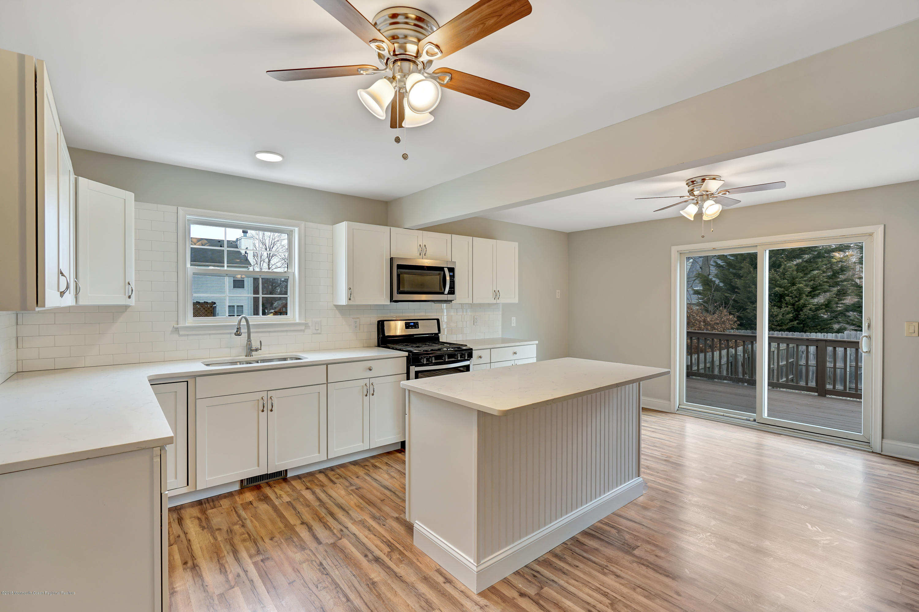 152 Bowline Road Manahawkin, NJ 08050 - Photo 12 of 29 a kitchen with a sink appliances and cabinets