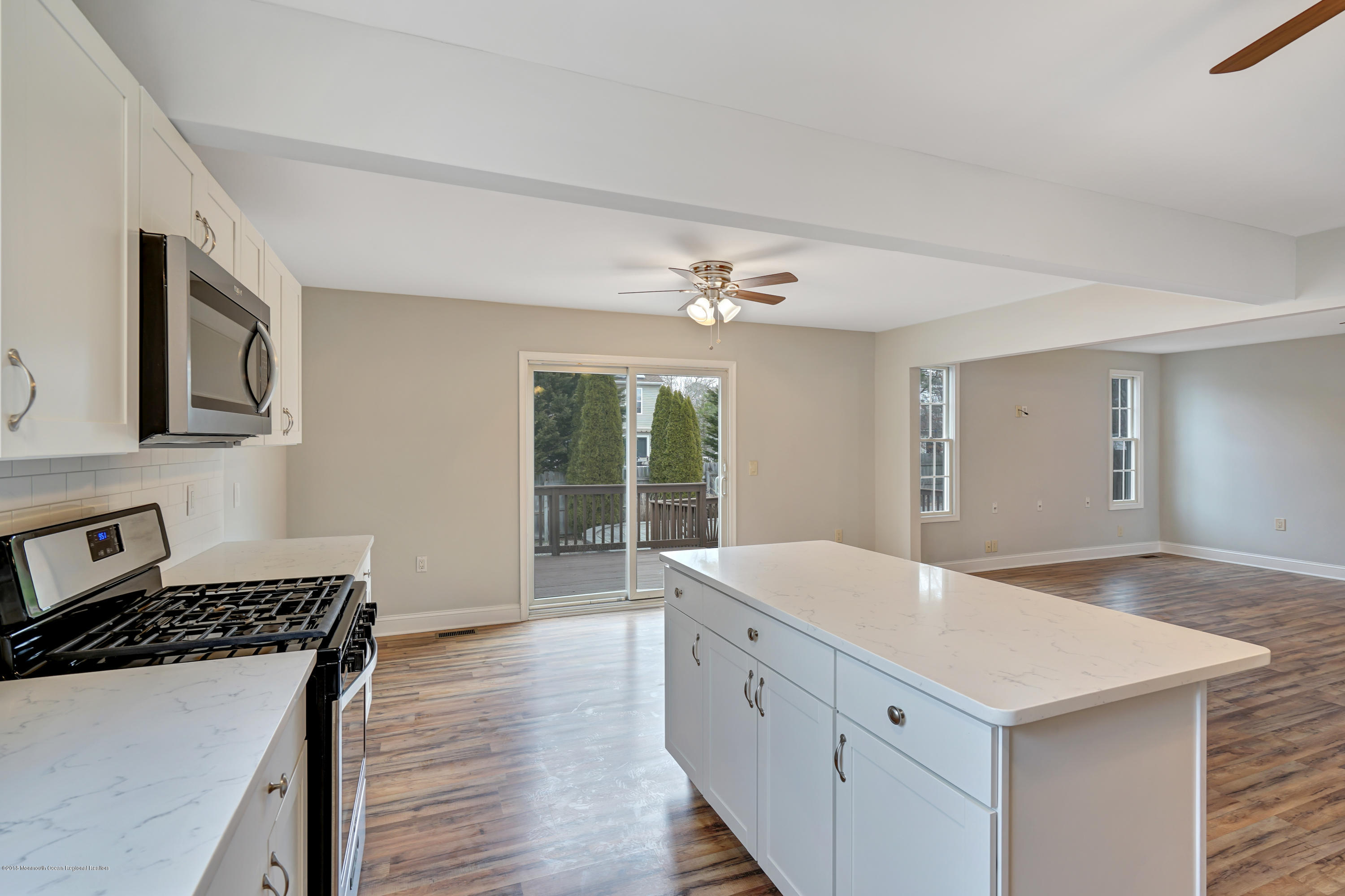 152 Bowline Road Manahawkin, NJ 08050 - Photo 13 of 29 a kitchen with a stove and a sink