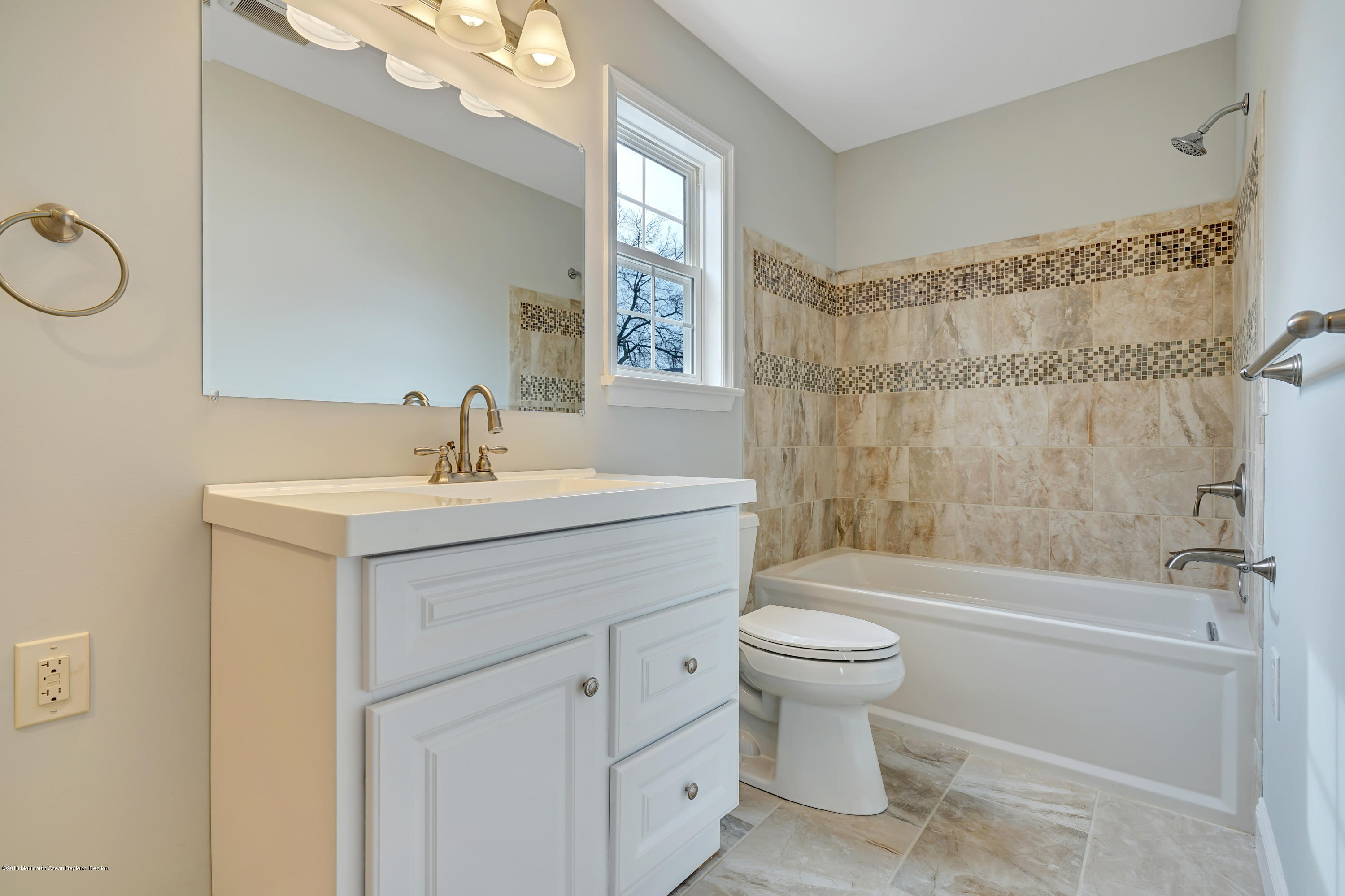 152 Bowline Road Manahawkin, NJ 08050 - Photo 18 of 29 a bathroom with a sink toilet tub and shower