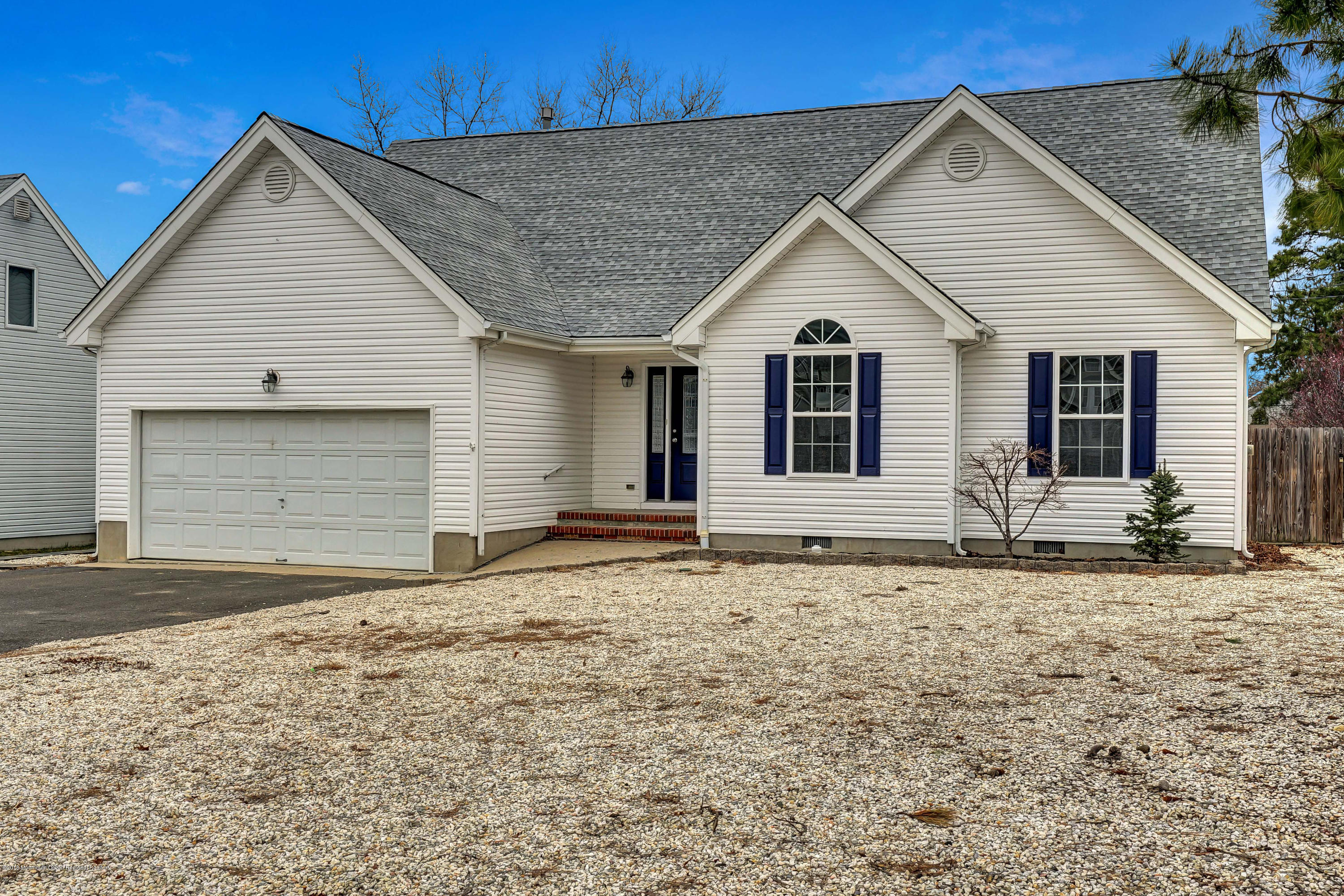 152 Bowline Road Manahawkin, NJ 08050 - Photo 2 of 29 a view of a house with a yard