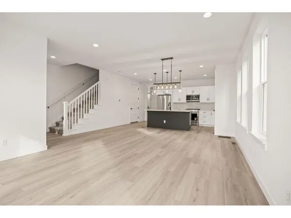 a view of kitchen and windows