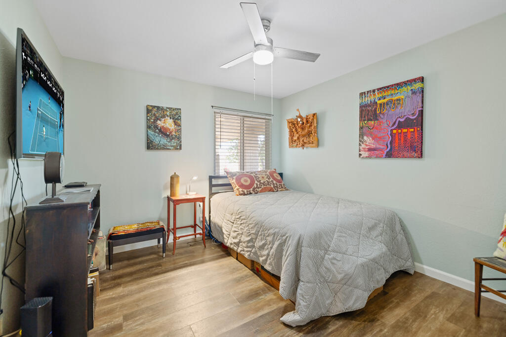 68110 Risueno Road Cathedral City, CA 92234 - Photo 12 of 33 a bedroom with a bed and a dresser