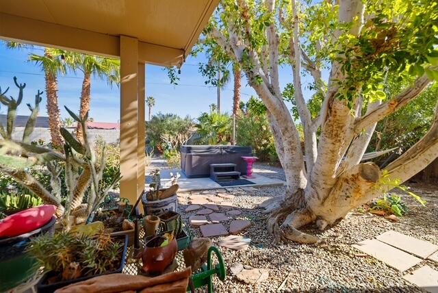 68110 Risueno Road Cathedral City, CA 92234 - Photo 17 of 33 a backyard of a house with seating space