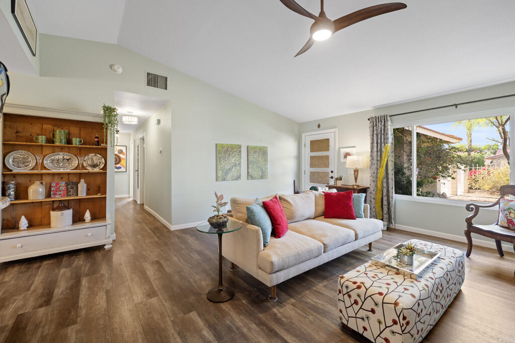 68110 Risueno Road Cathedral City, CA 92234 - Photo 2 of 33 a living room with furniture and a window