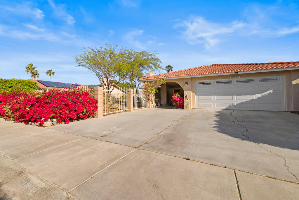 68110 Risueno Road Cathedral City, CA 92234 - Photo 27 of 33 a view of outdoor space and front view of a building