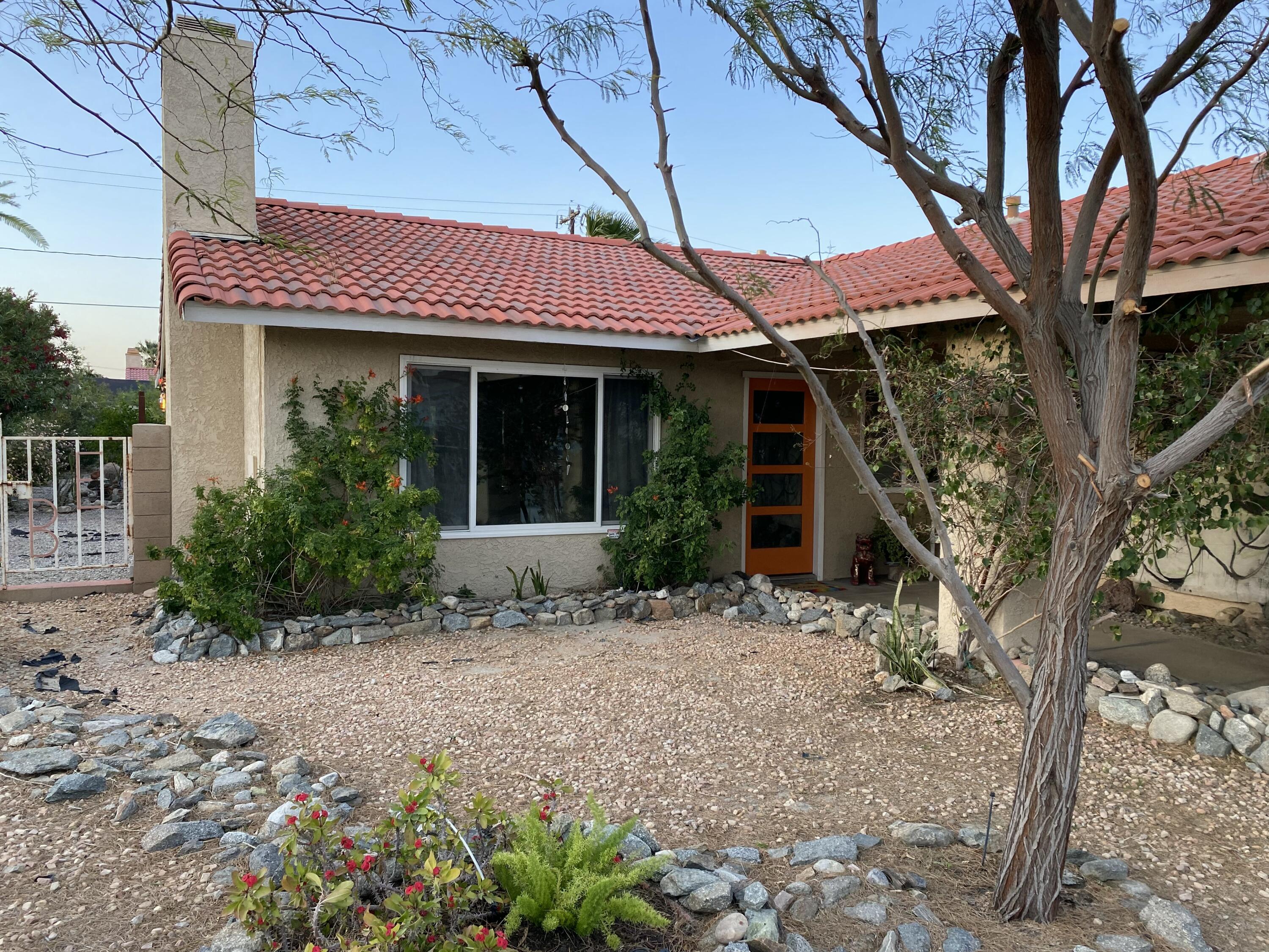 68110 Risueno Road Cathedral City, CA 92234 - Photo 30 of 33 a view of a house with a tree