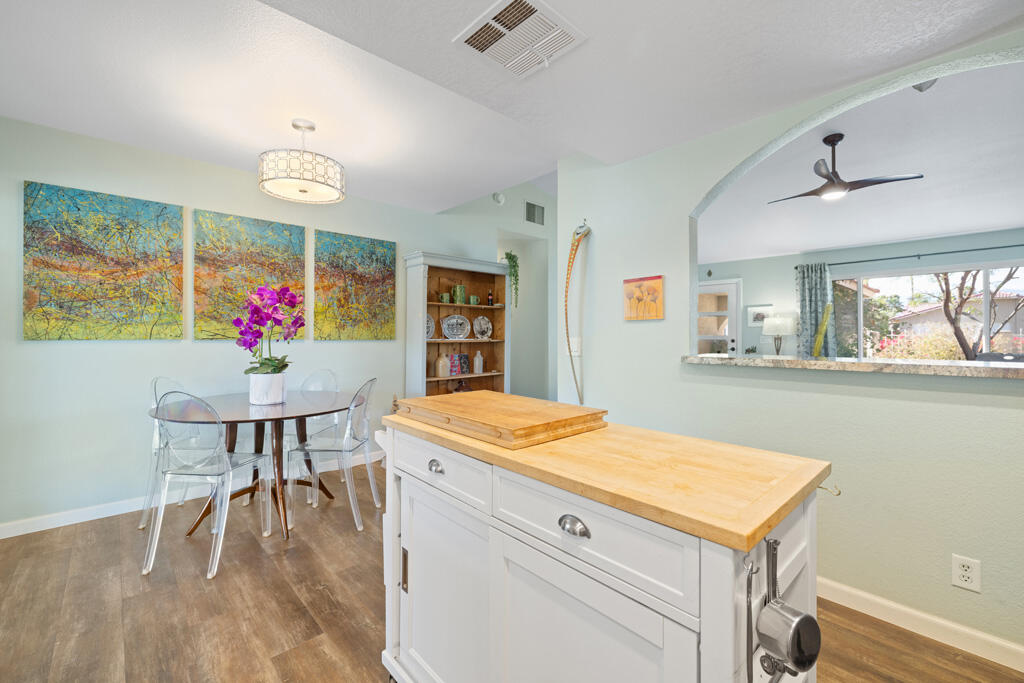 68110 Risueno Road Cathedral City, CA 92234 - Photo 7 of 33 a dining room with furniture and window