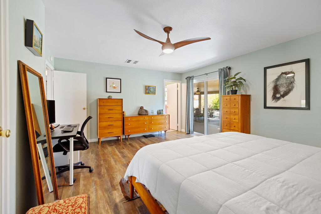 68110 Risueno Road Cathedral City, CA 92234 - Photo 10 of 33 a bed room with a bed and a flat screen tv