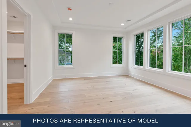 a bathroom with a sink a vanity and a window