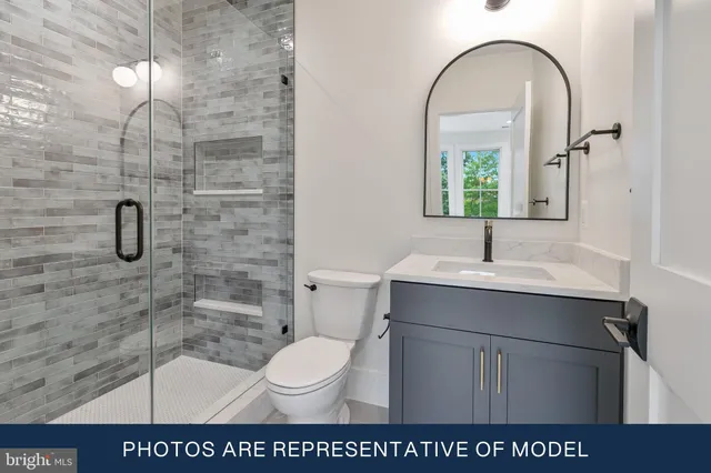 a view of a sink and a window