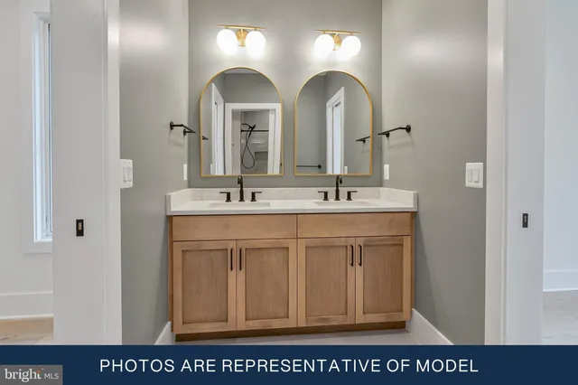 a view of kitchen with stainless steel appliances cabinets