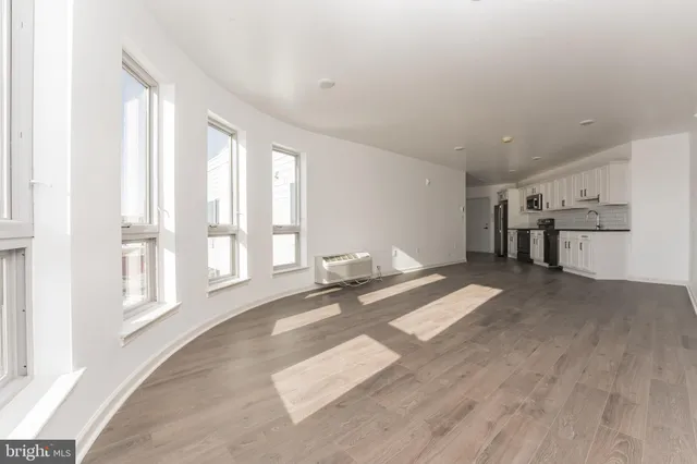 a view of livingroom with furniture and windows