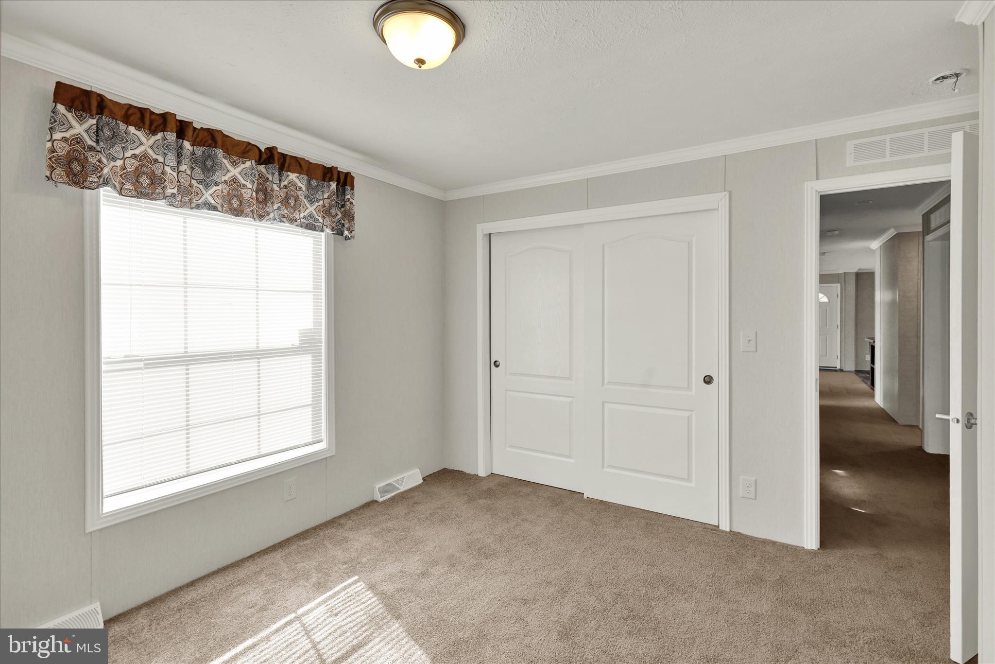 3450 Mountain Road, Unit M59 Hamburg, PA 19526 - Photo 30 of 35 an empty room with windows
