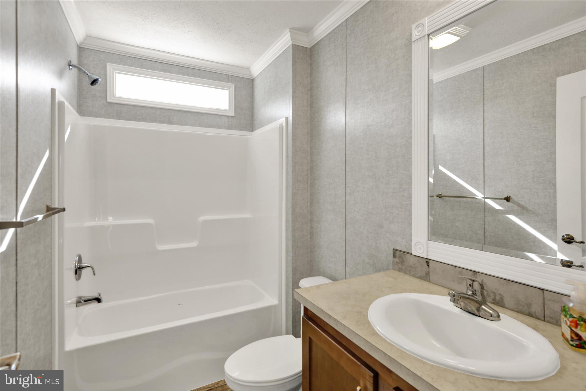 3450 Mountain Road, Unit M59 Hamburg, PA 19526 - Photo 31 of 35 a bathroom with a sink toilet and shower
