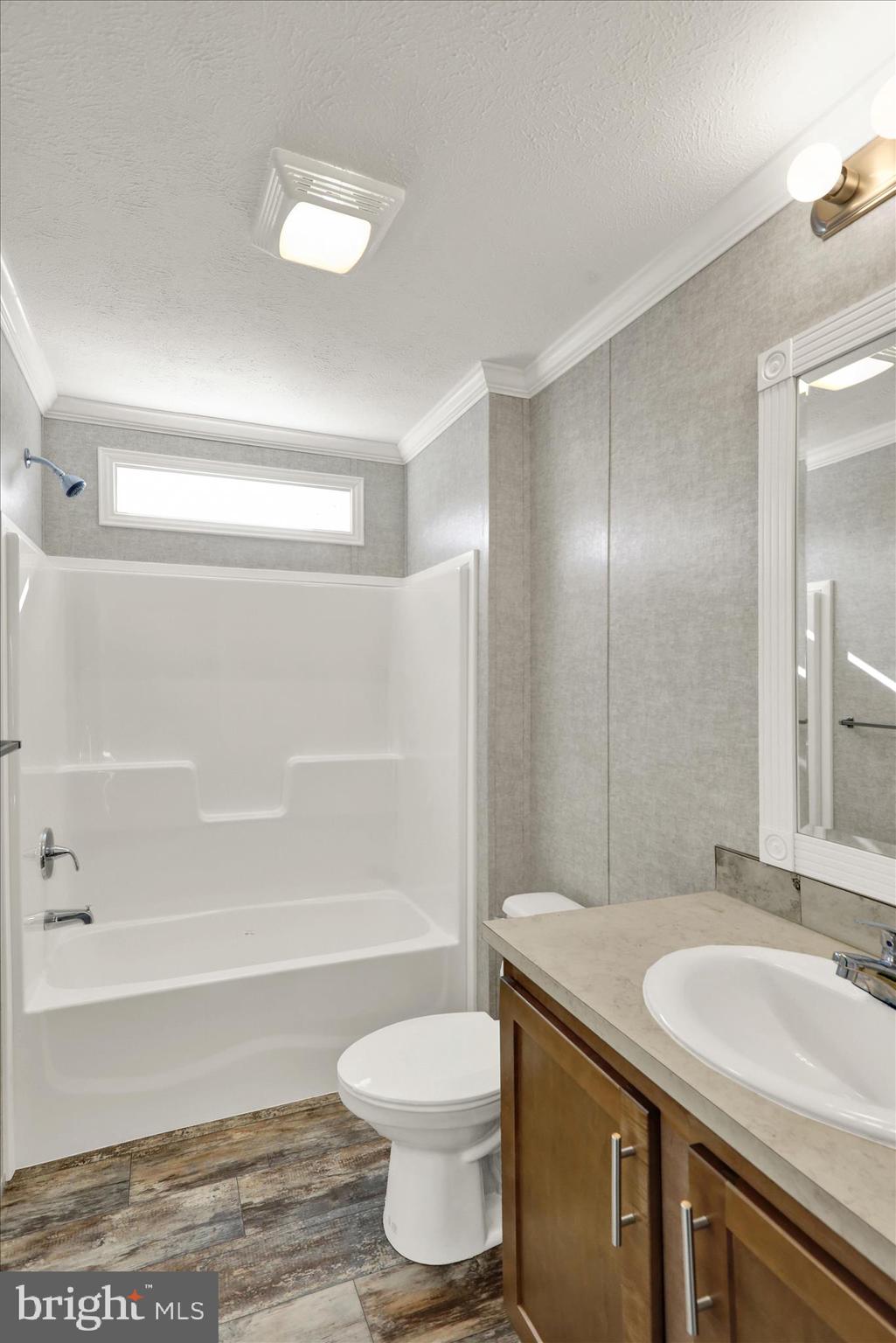 3450 Mountain Road, Unit M59 Hamburg, PA 19526 - Photo 32 of 35 a bathroom with a sink a toilet and shower