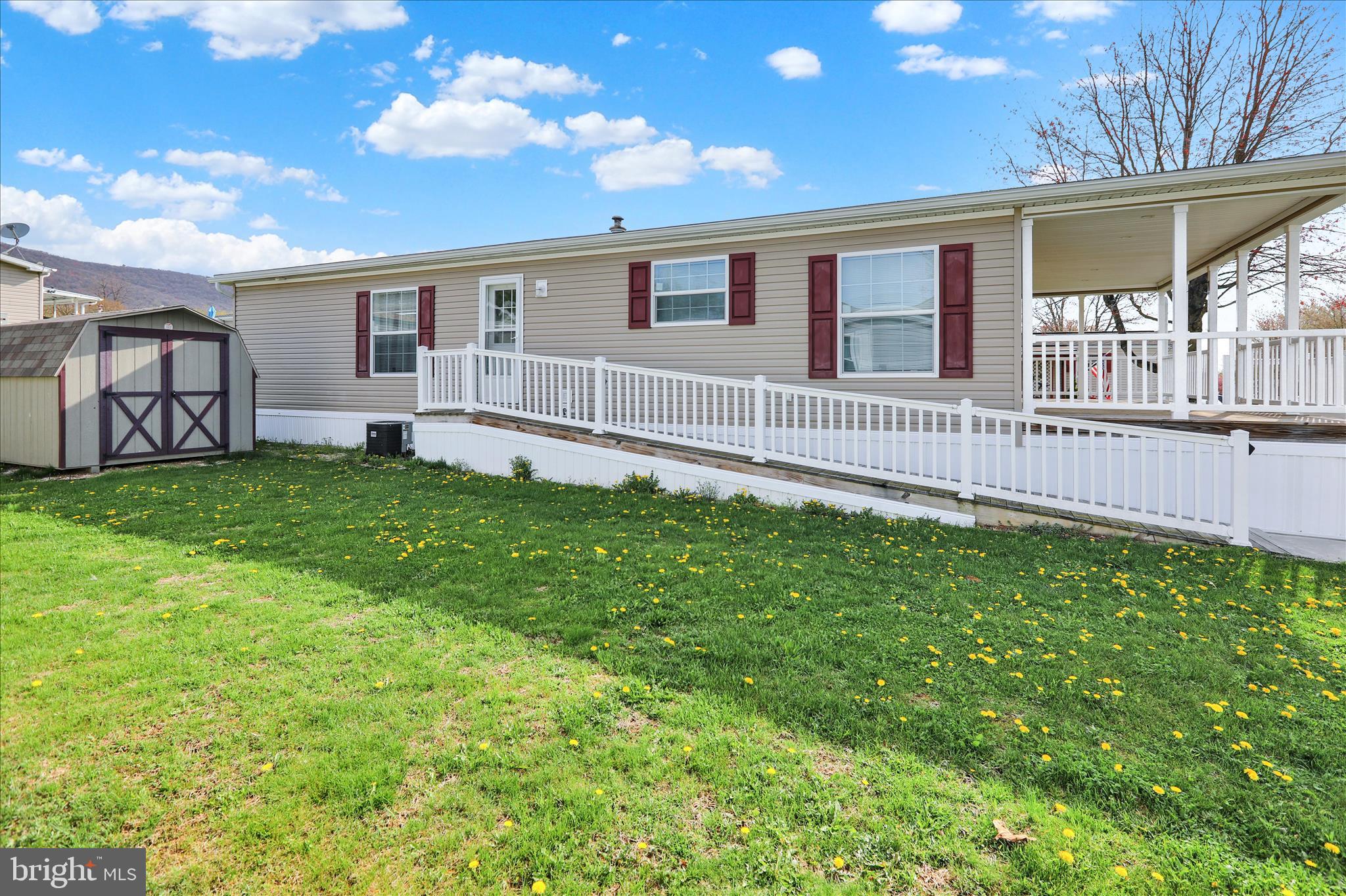 3450 Mountain Road, Unit M59 Hamburg, PA 19526 - Photo 33 of 35 a house view with a garden space