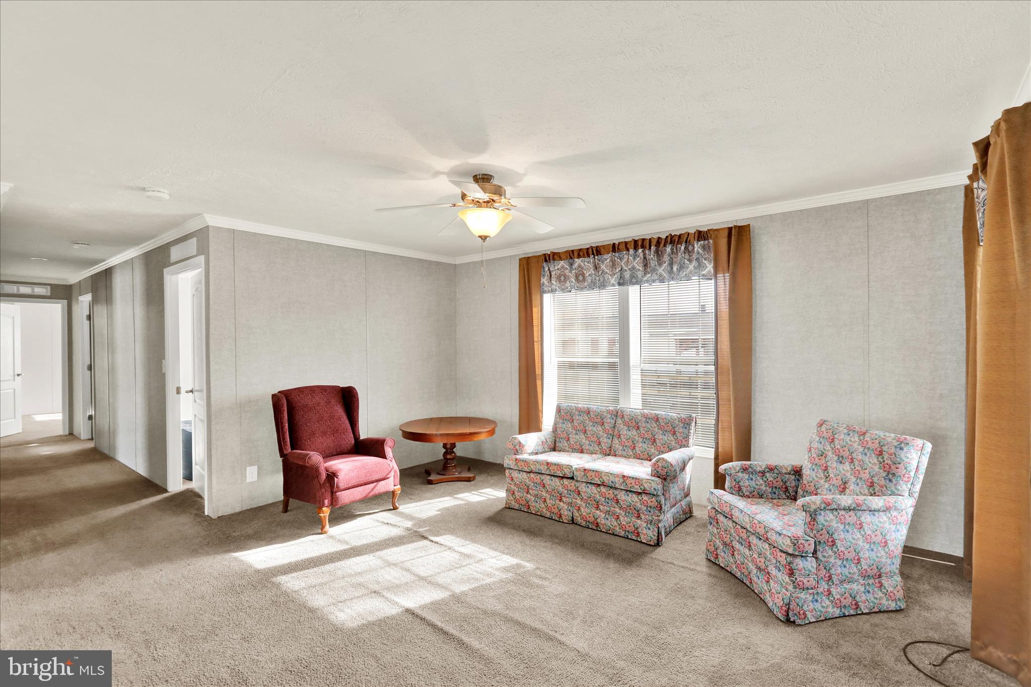 3450 Mountain Road, Unit M59 Hamburg, PA 19526 - Photo 9 of 35 a living room with furniture and a window