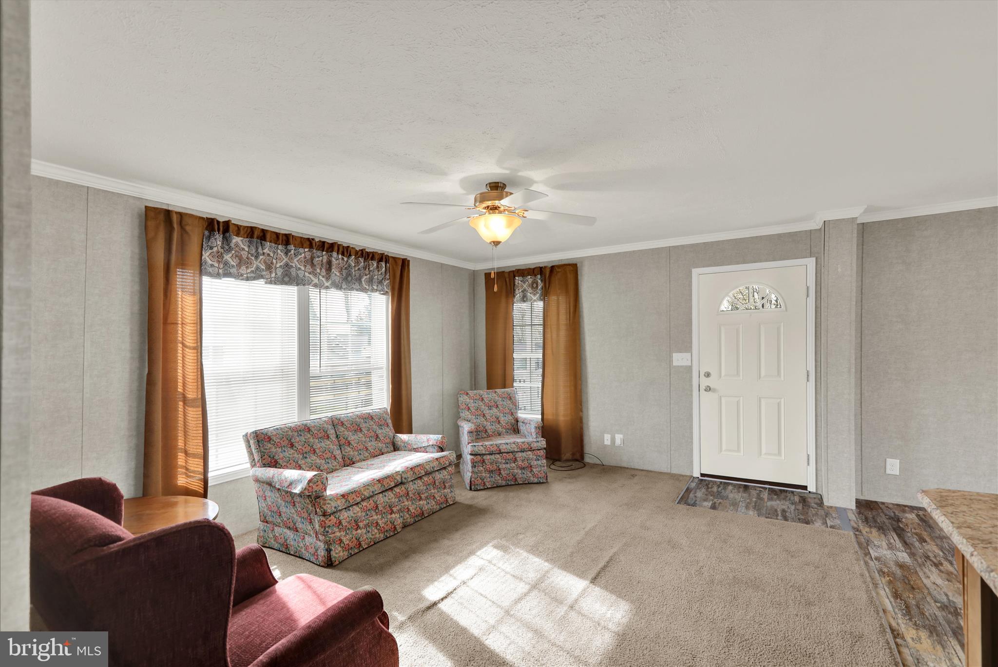 3450 Mountain Road, Unit M59 Hamburg, PA 19526 - Photo 10 of 35 a living room with furniture and a large window
