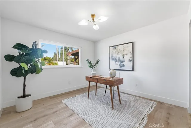 a view of a workspace with furniture