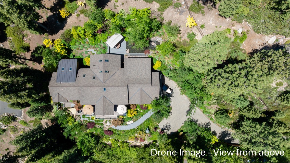 475 Tuscarora Road Crystal Bay, NV 89402 - Photo 48 of 49 an aerial view of a house with a yard and large trees