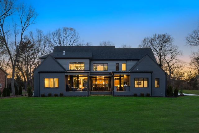 a view of an empty room and wooden floor
