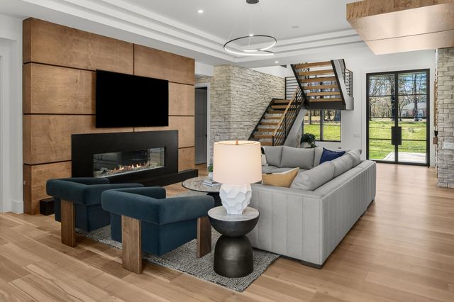 a bed room with a bed and a balcony