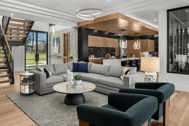 a bedroom with a bed and couch