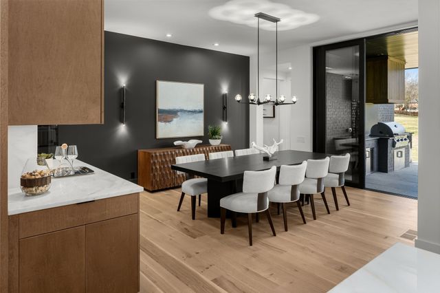 a bed room with a bed and a large window