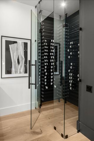 a view of a livingroom with furniture and a flat screen tv