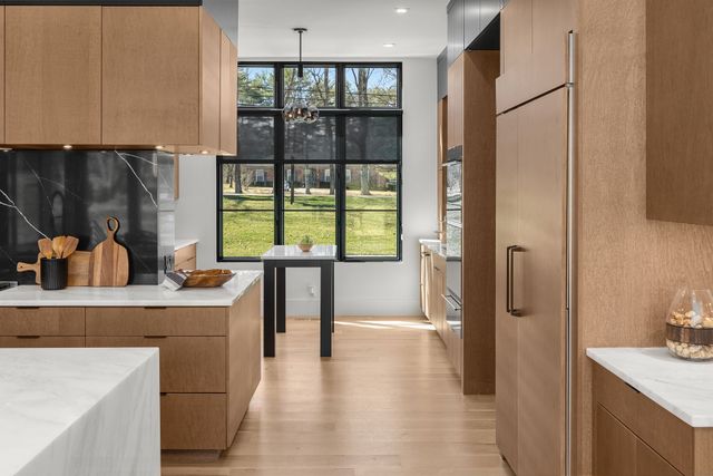 a view of a livingroom with furniture and a flat screen tv