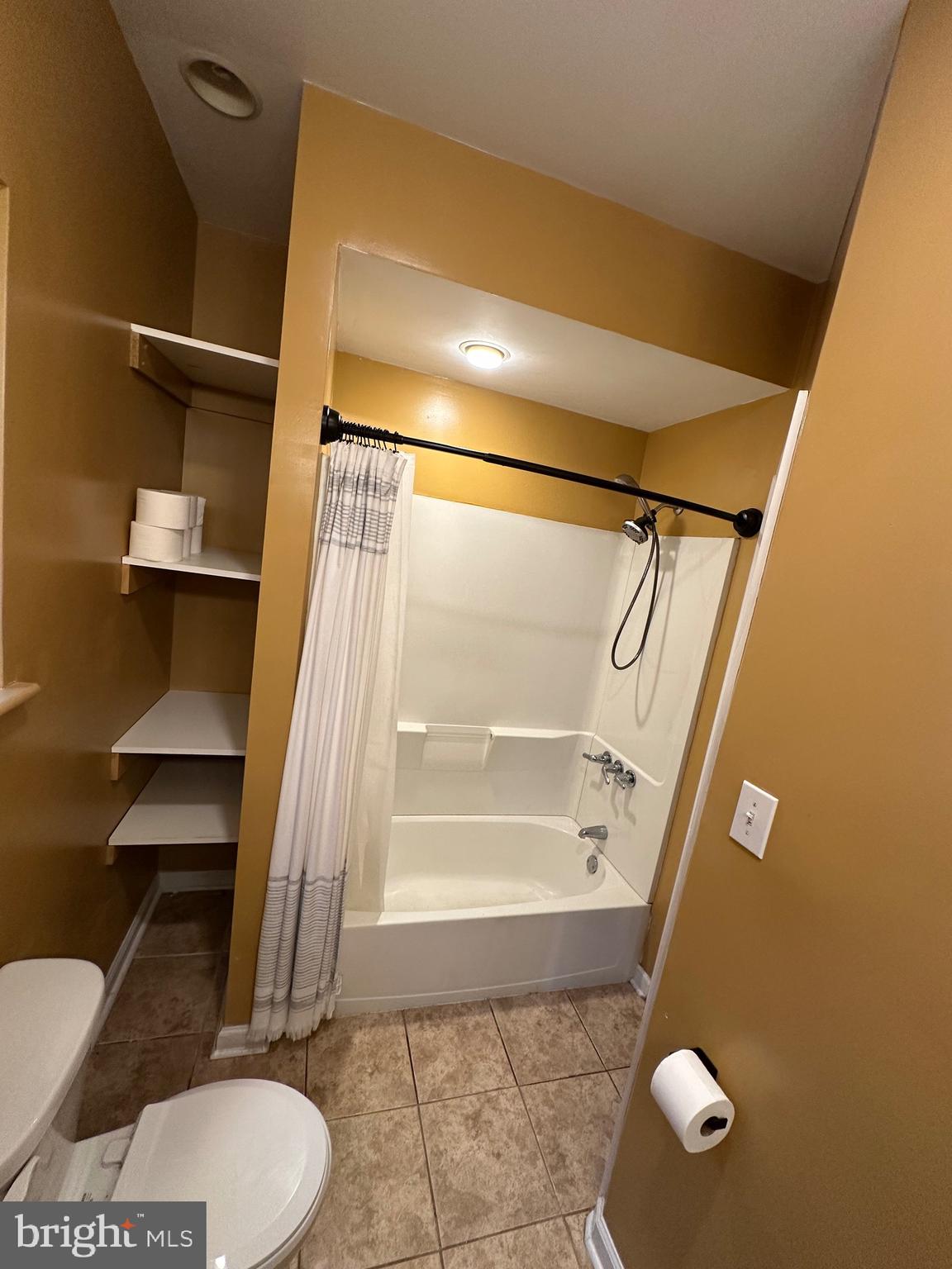 2528 South 13th Street, Unit 2 Philadelphia, PA 19148 - Photo 7 of 7 a bathroom with a toilet and a shower